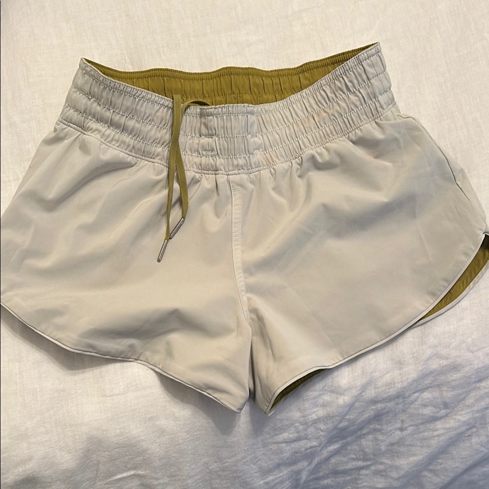 Cream and Green Athletic Shorts with Elastic Waistband